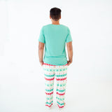 Man in Mint Holiday themed bamboo pjs.