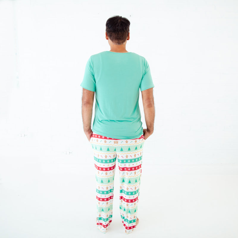Man in Mint Holiday themed bamboo pjs.
