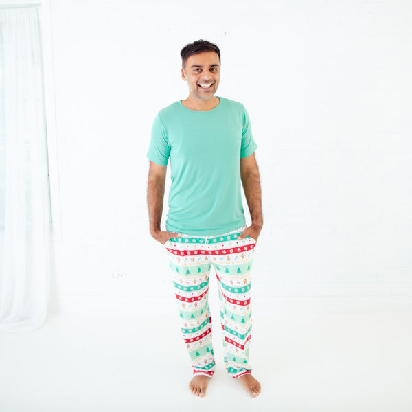 Man wearing Mint Faire Isle Holiday Pajamas.