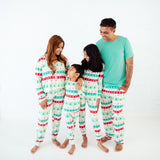 Family of four wearing matching bamboo pajamas.