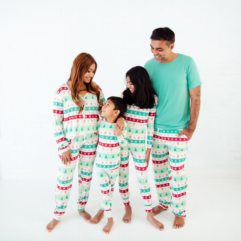 Family of four wearing matching bamboo pajamas.