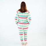 Back view of woman in holiday pajamas.