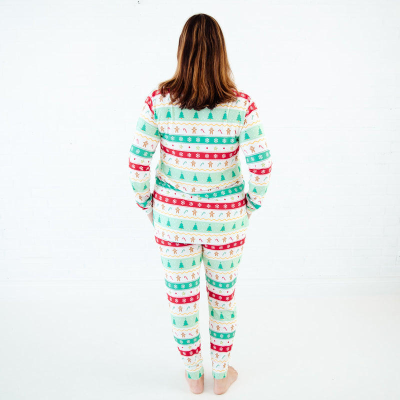 Back view of woman in holiday pajamas.