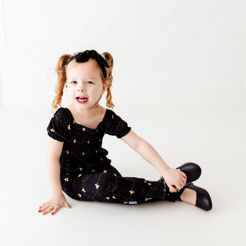Bumble and Kind Smocked Romper - Black