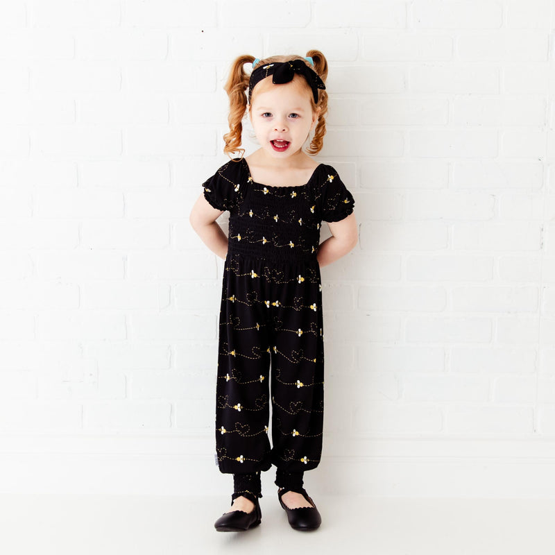 Bumble and Kind Smocked Romper - Black