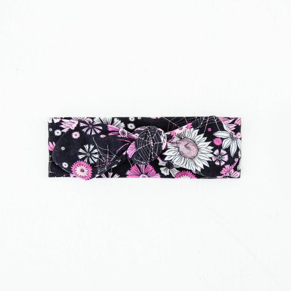 Black and pink floral headband for girls.