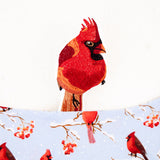 Embroidered cardinal bird on a child's lovey.
