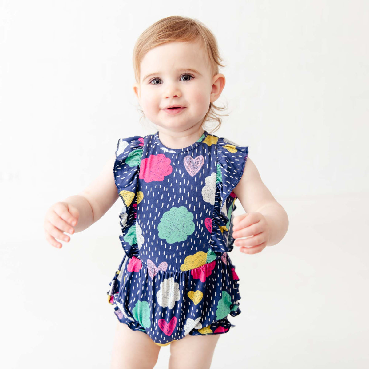 Baby bubble romper with soft clouds pattern by Dreamiere