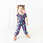 Love Reigns Smocked Romper