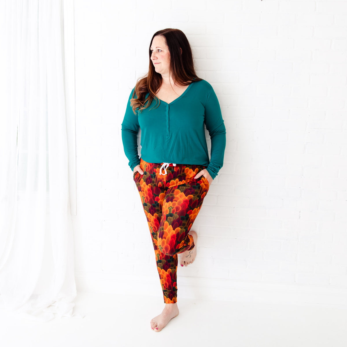 Matching convertible footie and women's loungewear set by Dreamiere