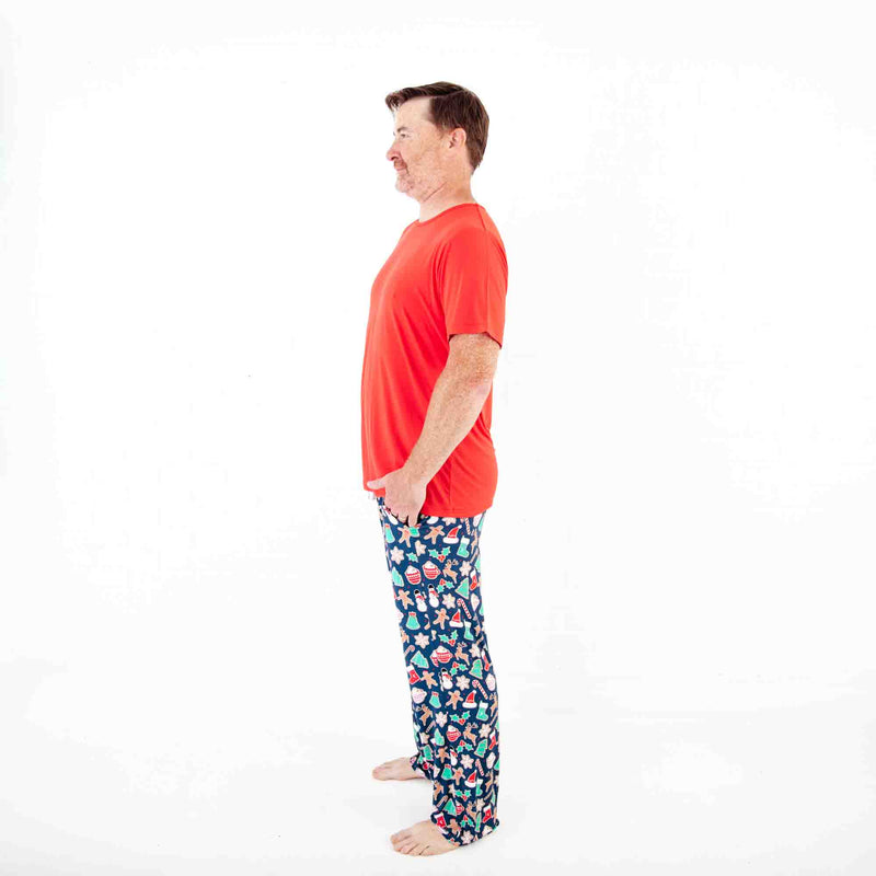 Man wearing Navy Christmas printed pajama pants.