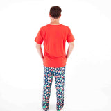 Man in Red Shirt and Pajama pants.