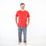 Man wearing Red and Navy Christmas Pajamas.