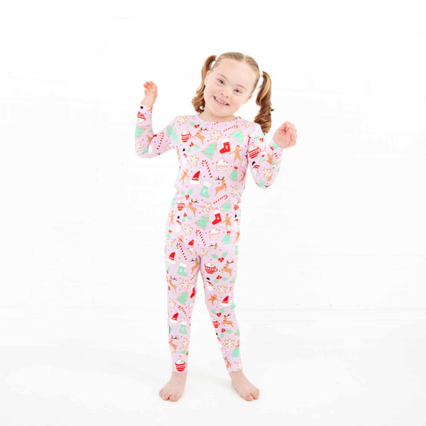 Child wearing Pink Christmas themed Bamboo Pajamas.