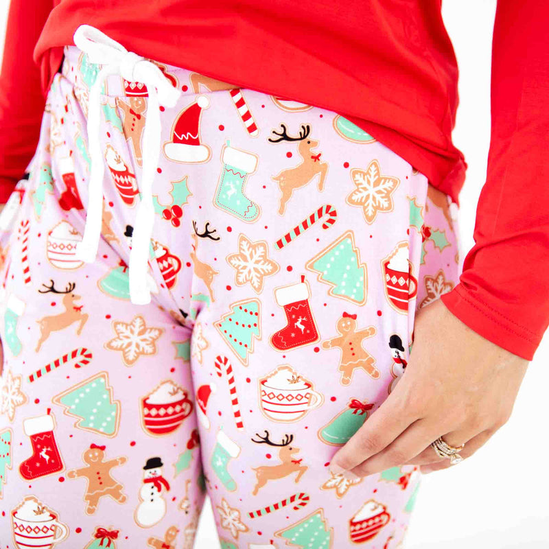 Close-up of Pink and Red Christmas Pajamas pants.