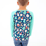 Boy wearing a Navy Christmas themed Raglan.