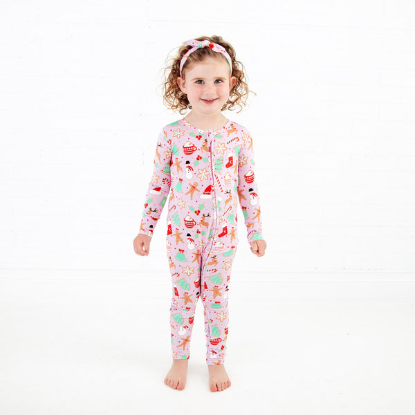 Little Girl Wearing Christmas Bamboo Footie Pajama