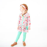 Girl wearing bamboo tunic and leggings outfit.