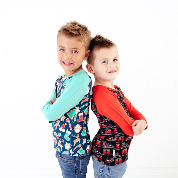 Two boys wearing matching Holiday Raglan Shirts.