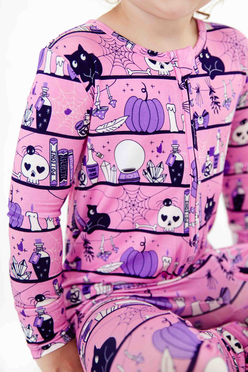 Halloween zipper pajamas in pink and purple.