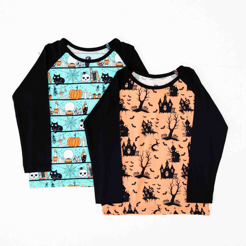 Two Halloween-themed long-sleeve shirts.