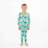 Child wearing Teal Halloween Bamboo Pajamas. 