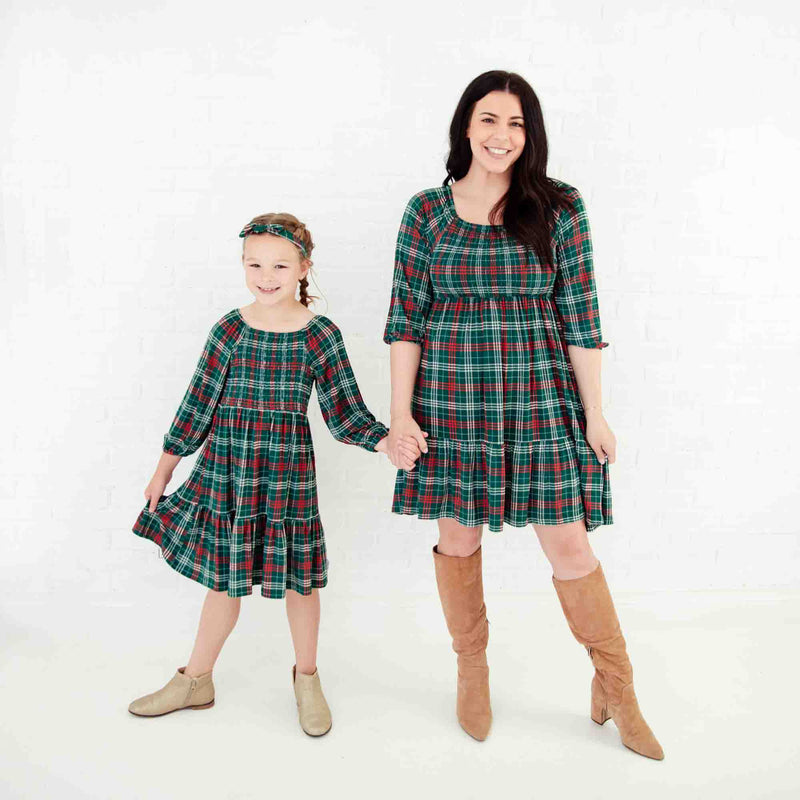 Mom and daughter in matching Holiday Dresses. 