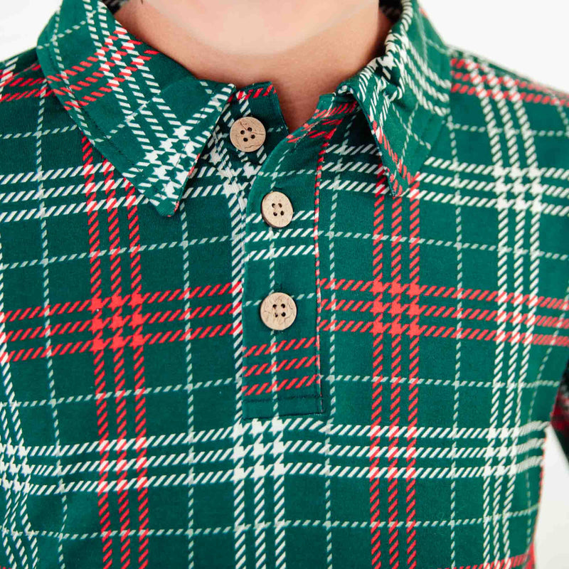 Close-up of a green plaid polo shirt collar. 
