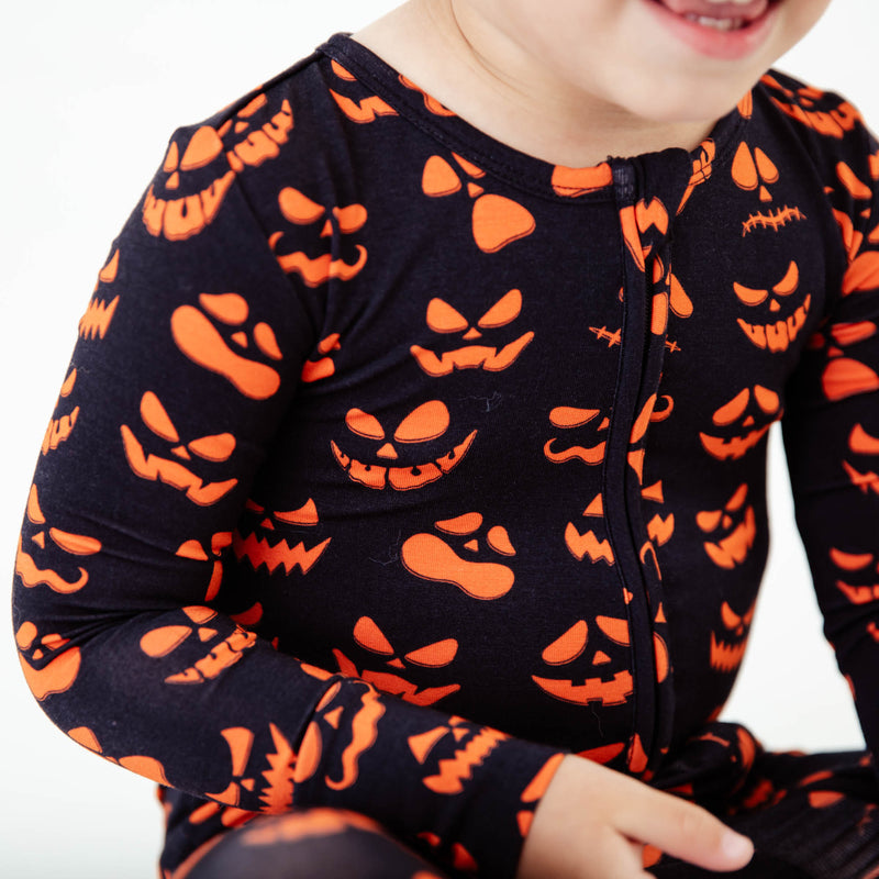 Close-up of jack-o-lantern pajamas. 