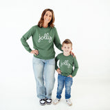Mom and son in matching Green Jolly shirts. 