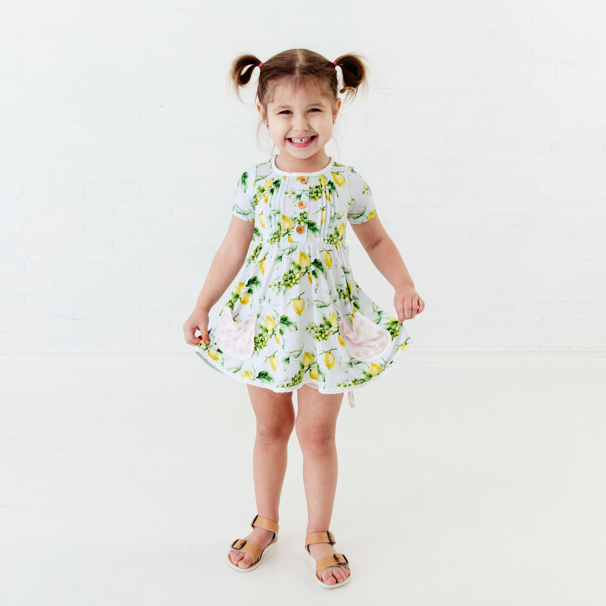 Girls' peplum top and shorts set with lemon and lace details by Dreamiere