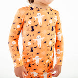 Mummys and cat print on halloween pajamas.