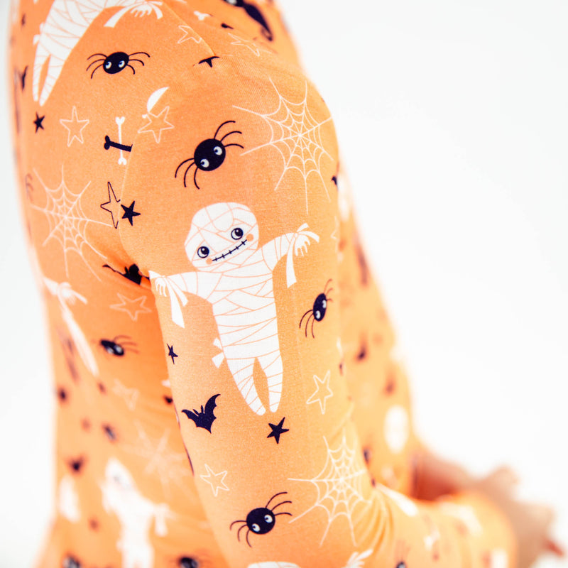 Close-up of a mummy on halloween pajamas.