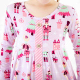 Close-up details on a girls shirt. 