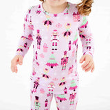Purple and pink nutcracker pajama print. 