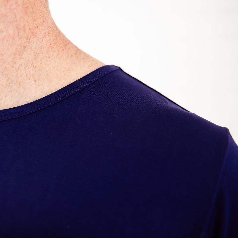 Shoulder of a navy blue shirt. 