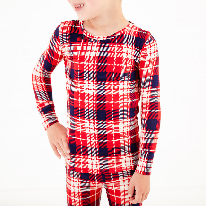 Close-up of red and blue print pajamas. 