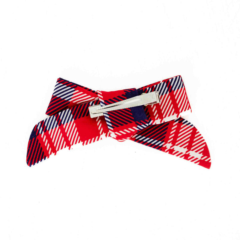 Back of a red plaid holiday bow. 
