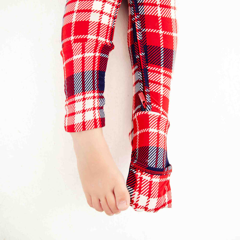 Childs feet showing convertible footie options.