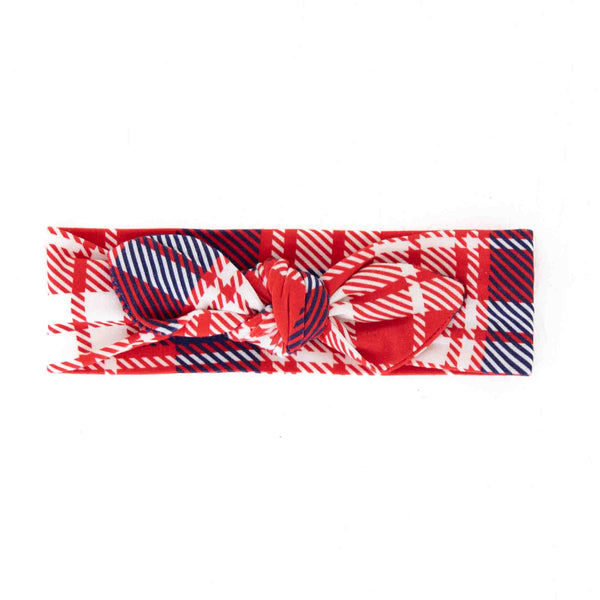 Red plaid holiday knotted headband. 