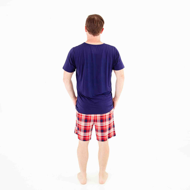 Man in plaid bamboo shorts pajamas. 