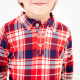 Close-up of a red plaid polo shirt collar. 