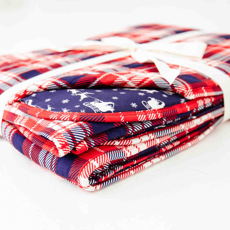 Corner of a folded holiday blanket. 