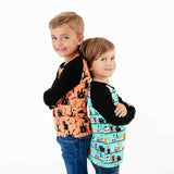 Two children wearing Halloween-themed shirts. 