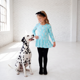Dalmatian and girl wearing dalmatian themed daywear set