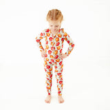 Child wearing fall bamboo zipper pajamas. 