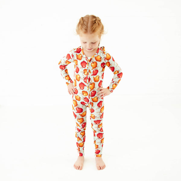 Child wearing fall bamboo zipper pajamas. 