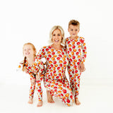 Mom and kids wearing matching fall bamboo pajamas. 