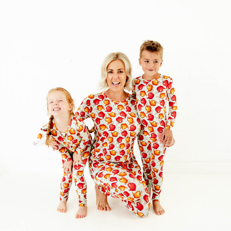 Mom and kids wearing matching fall bamboo pajamas. 