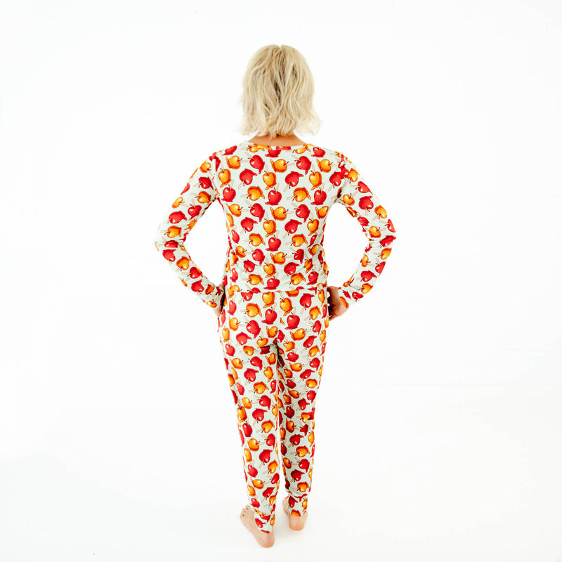 Back view of a woman in fall pajamas.